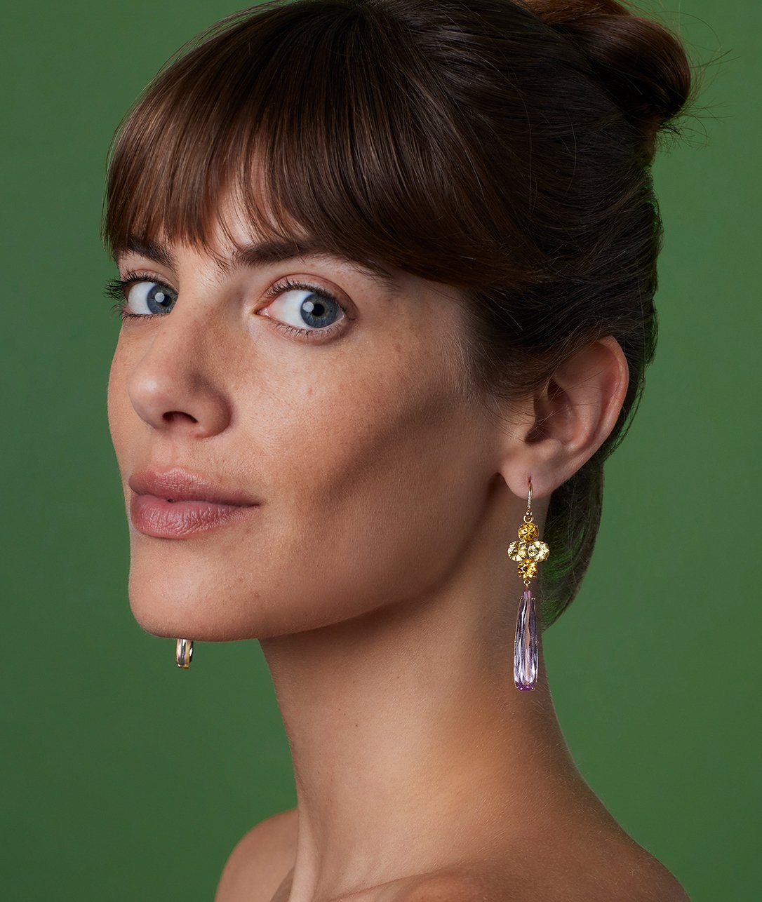 Our new Domino Drop Earrings feature quartets of dynamic yellow beryl and exquisite pear shaped kunzites.