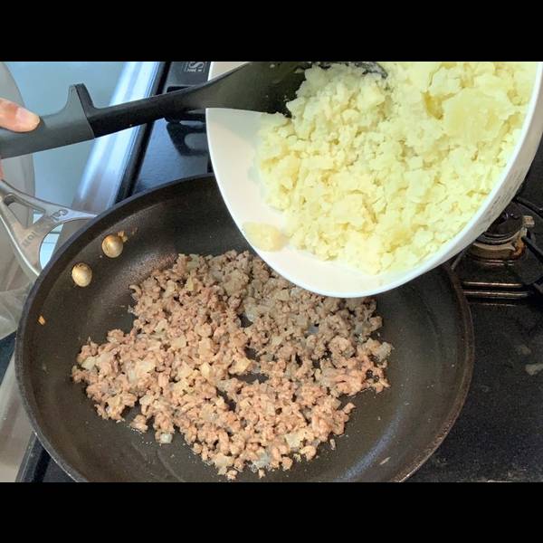 Combing the Potatoes and Meat Mixture