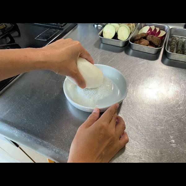 Grating the daikon