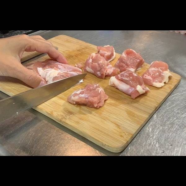 Cutting the Chicken Into Bite Sized Pieces