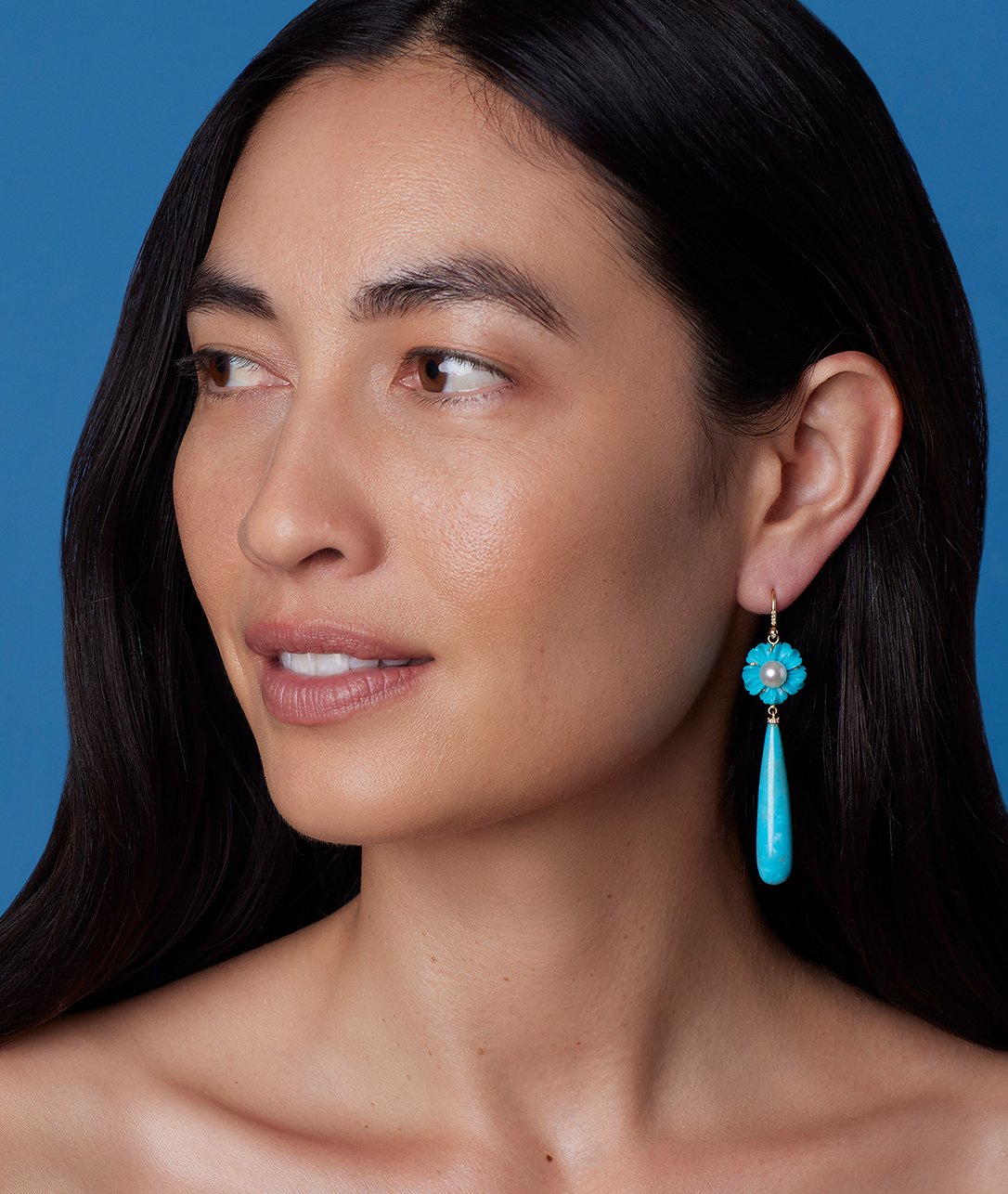 Pearls and diamond pavé add a little extra to our Turquoise Cherry Blossom Briolette Drop Earrings.SHOP TURQUOISE BOTANICAL