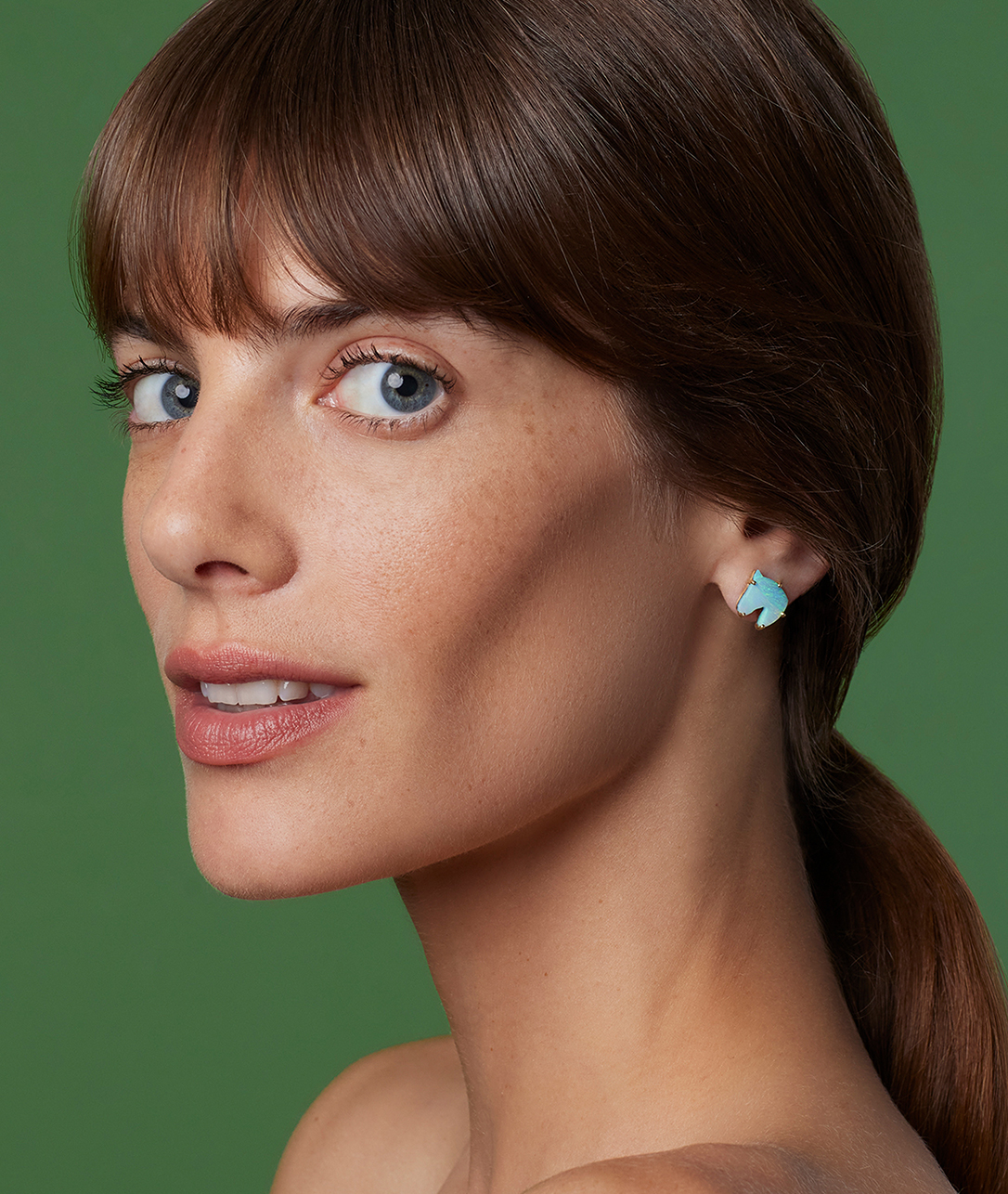 Two of Irene's favorite things in one pair of earrings: horse silhouette opal studs.SHOP OPAL STUDS