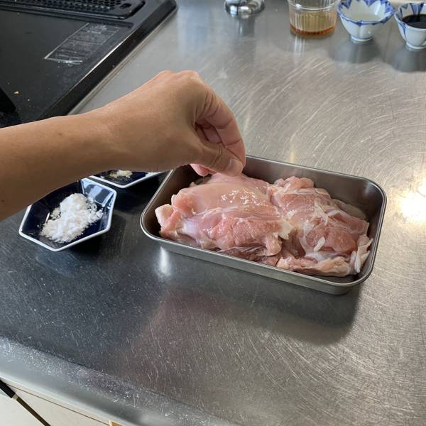 Seasoning the chicken
