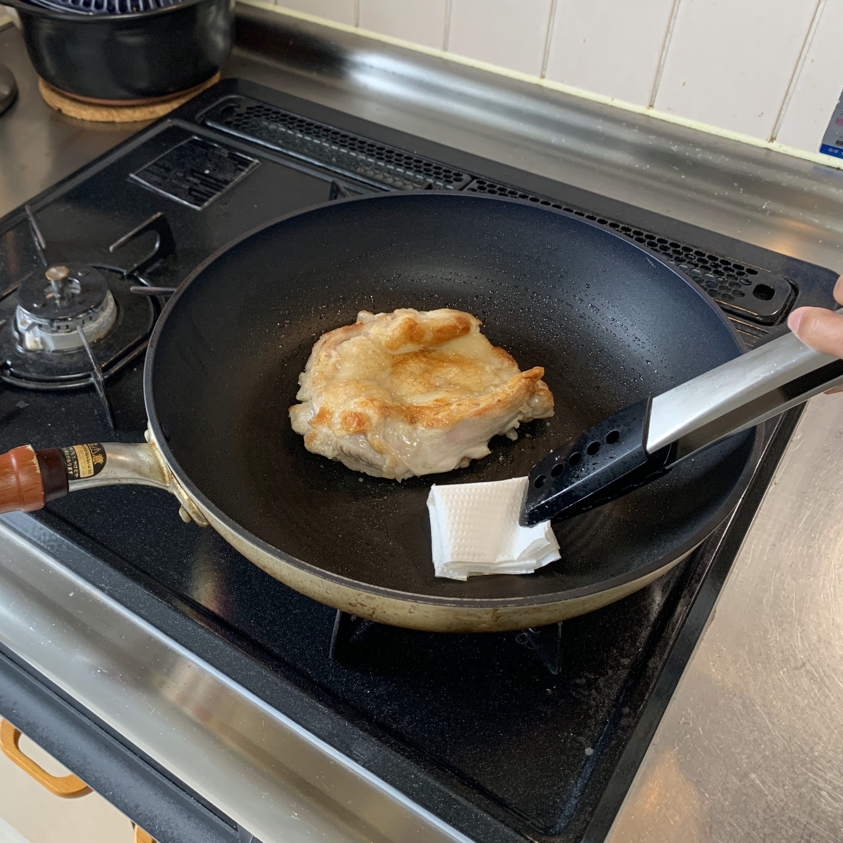 Wiping the excess oil away