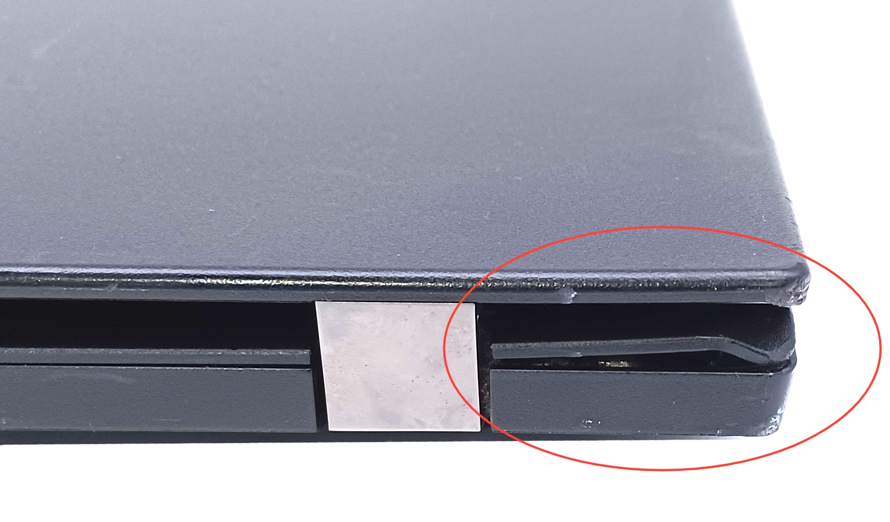 Device #1 - Damaged in rear corner
