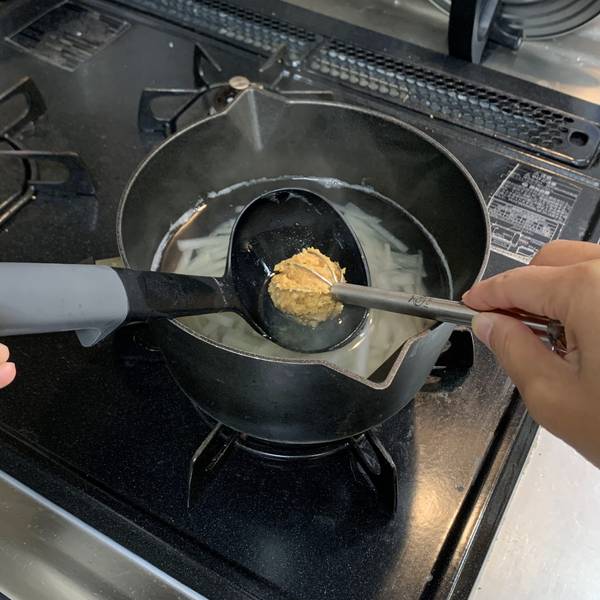 Adding the miso paste