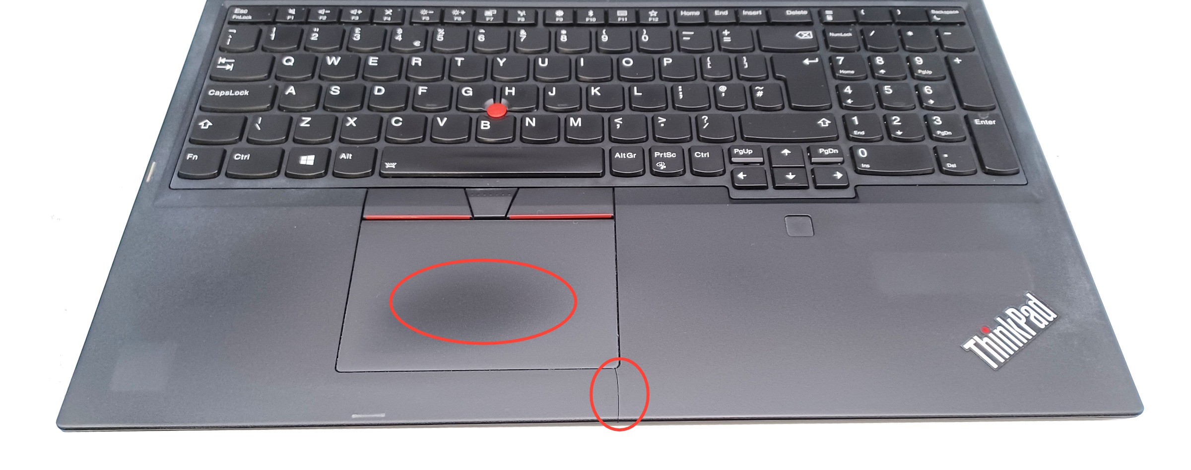 Device #1 - Worn/shiny touchpad and crack in palm rest