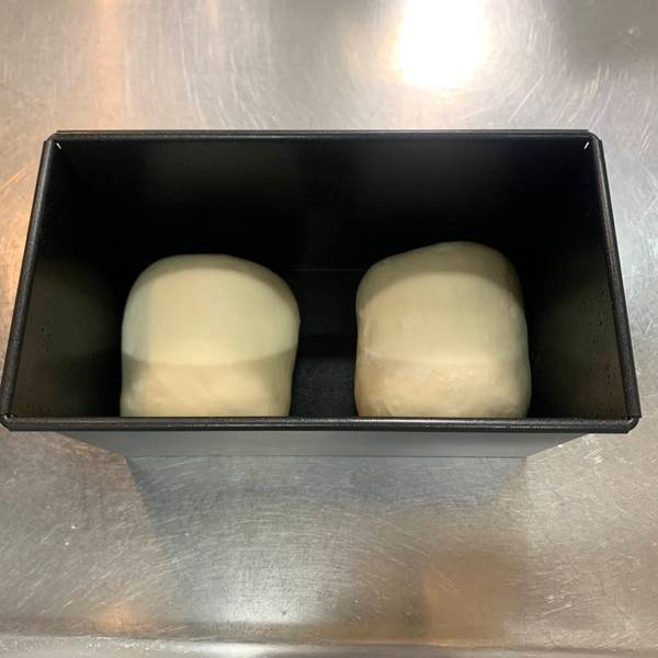 Shaped dough in the bread mold 