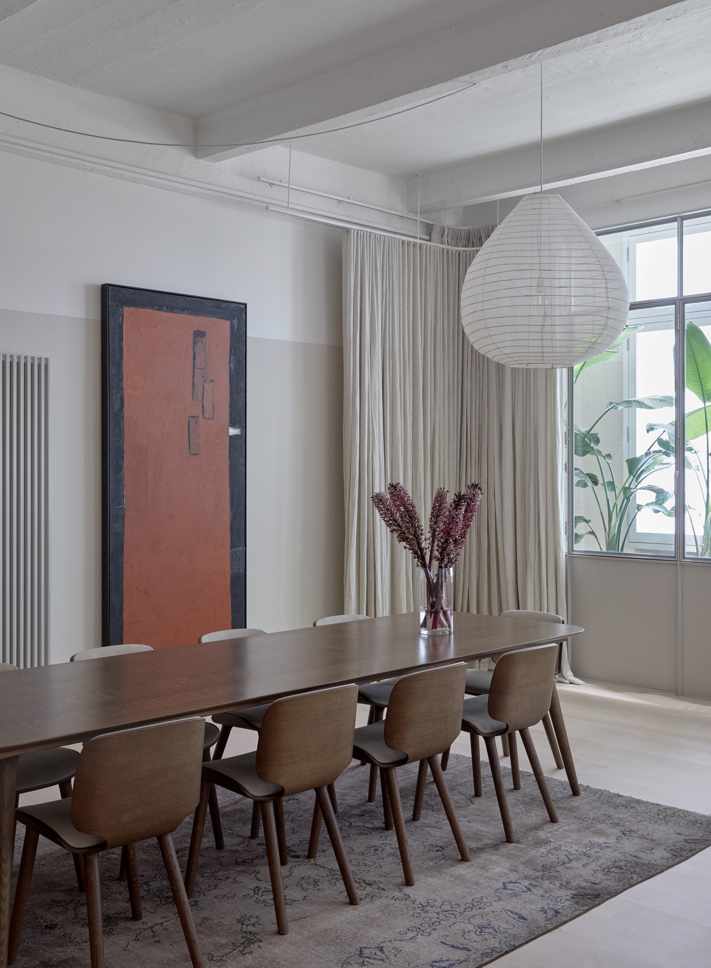 In the dining room the upholstered timber Nut chairs and the solid timber Zio table designed by Marcel Wanders for Moooi. Photo © James Geer.