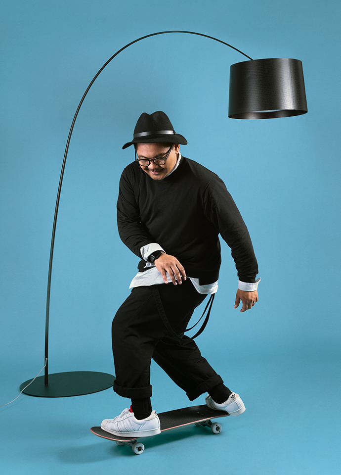 Saifuddin Johar and the Twiggy lamp by Marc Sadler for Foscarini. Photo © Franz Navarrete.