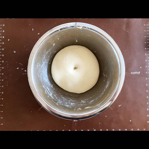 Testing the dough to see if it's ready