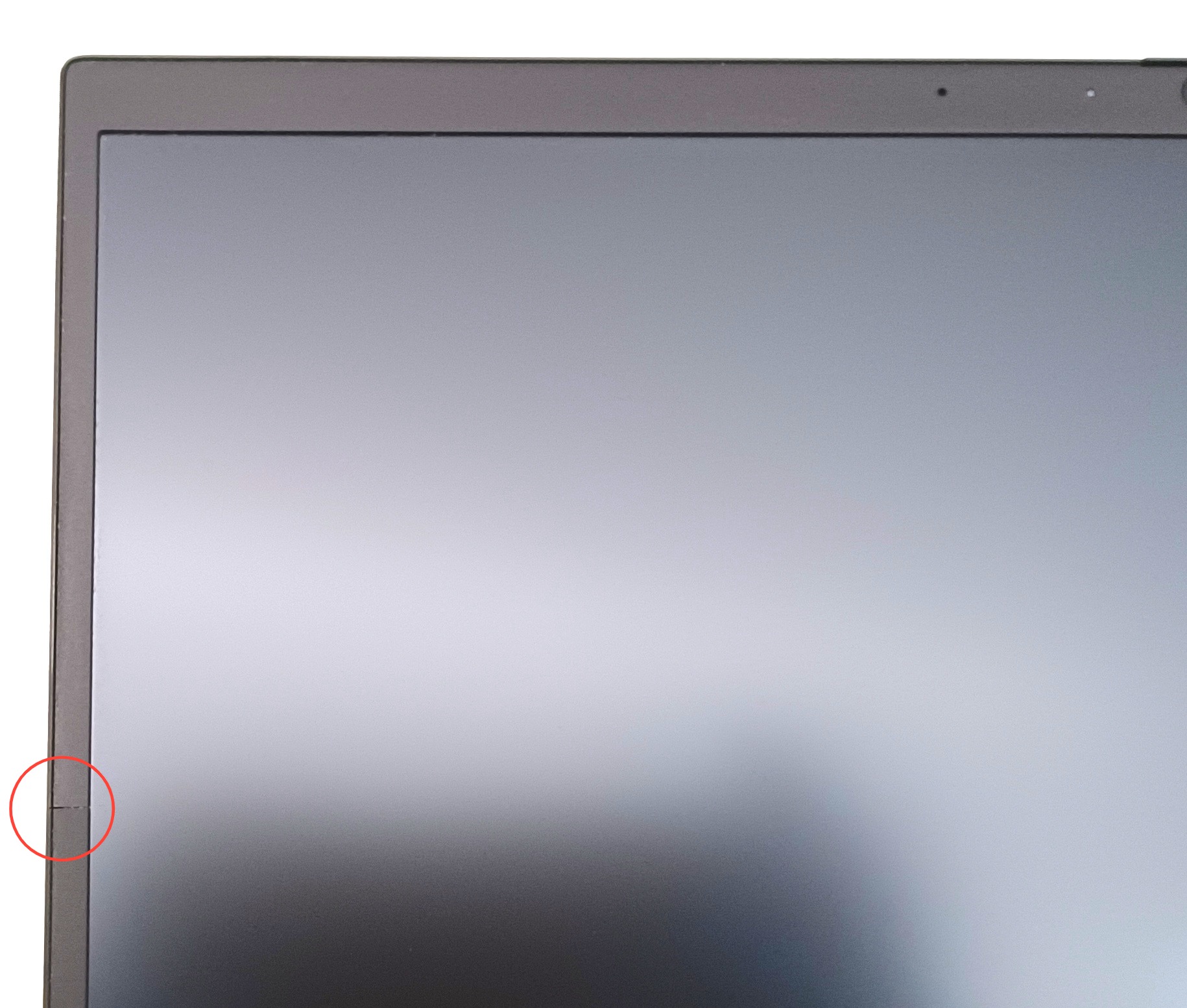 Device #1 - small crack in screen bezel