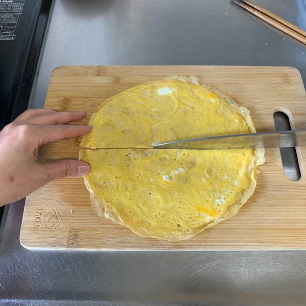Cutting the egg in half