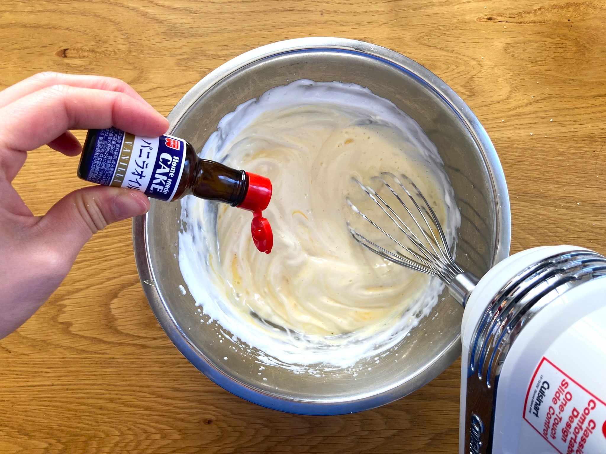 Adding in the vanilla extract 