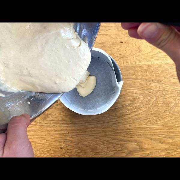 Pouring the cake batter into the mold