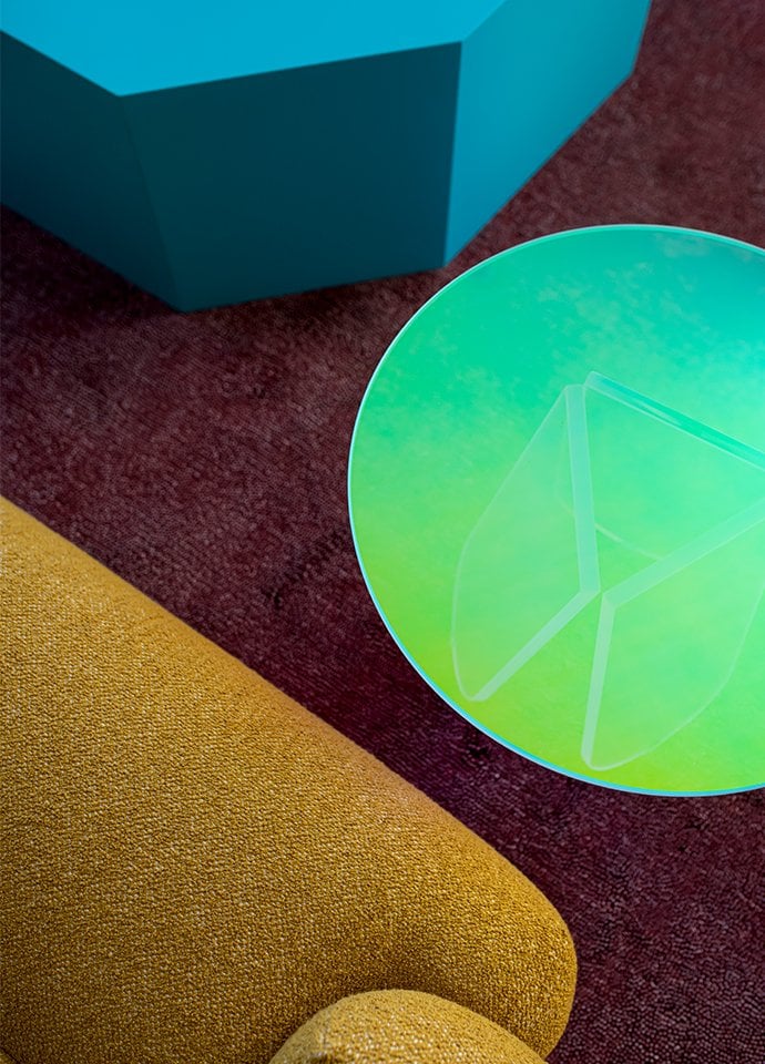 The Shimmer side tables shows luminous colours that seem to change when seen from different angles. Photo © Mindi Cooke
