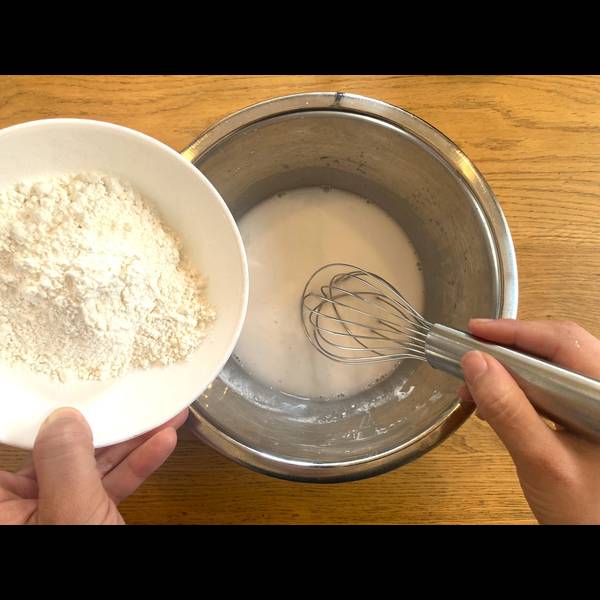 Adding the all purpose flour and sugar into the dough
