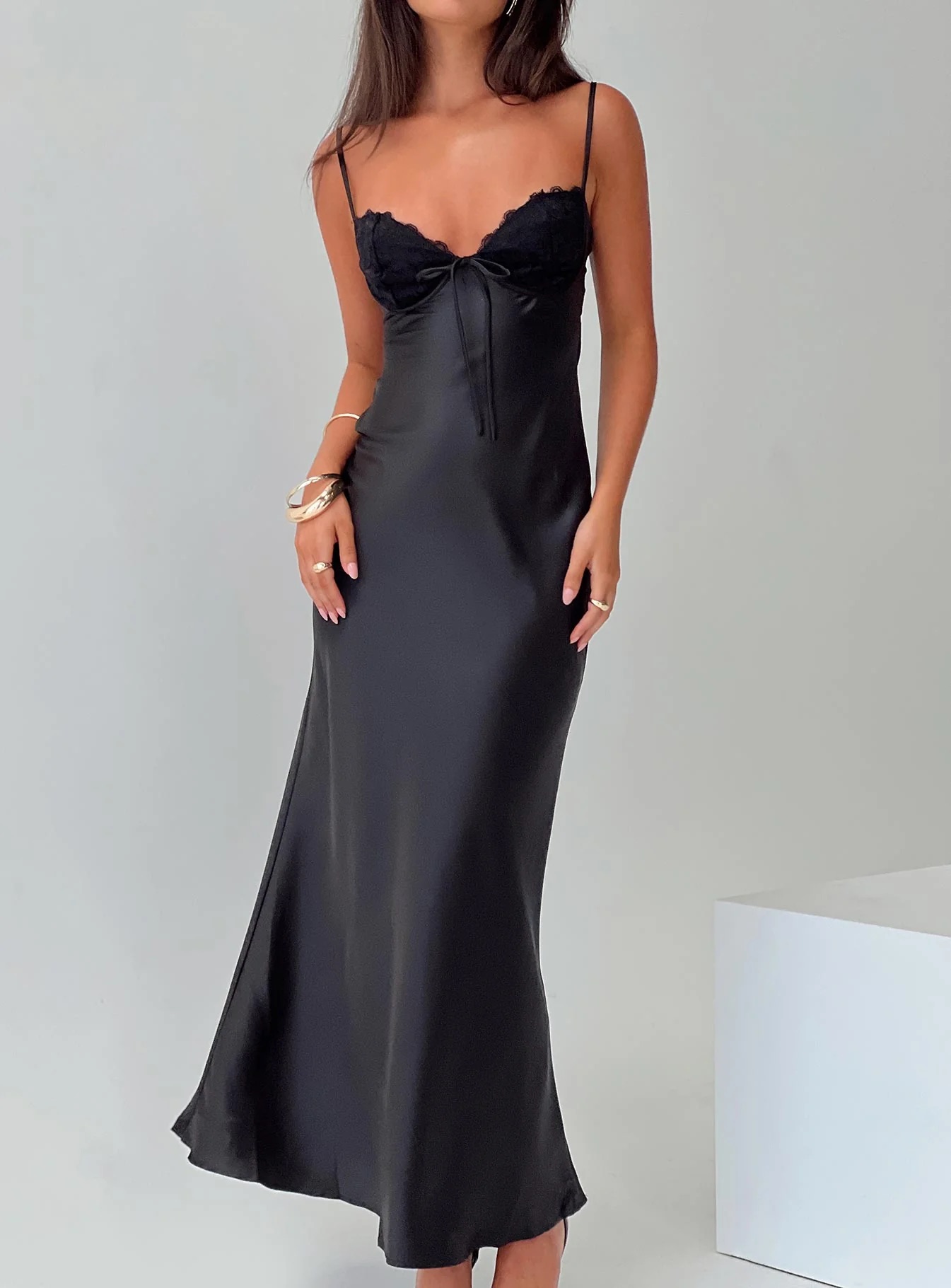 woman wearing black maxi dress for rush week preference night