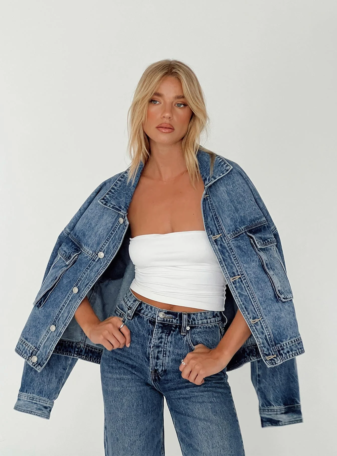 woman wearing denim jacket