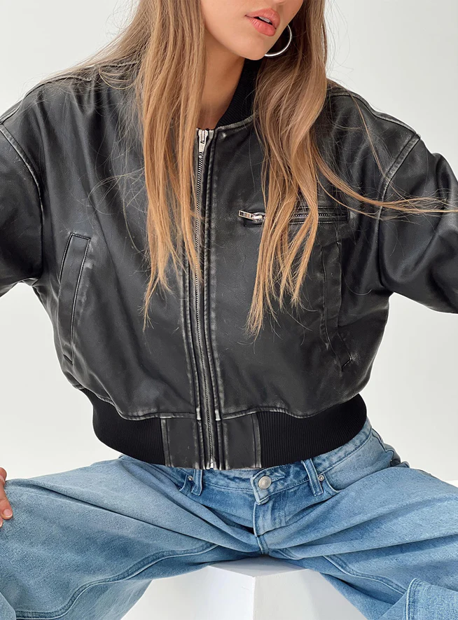 woman wearing black bomber jacket