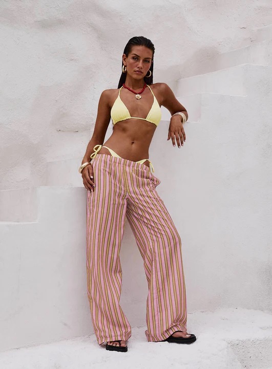 woman wearing stripe pink pants in europe
