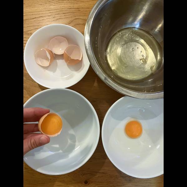 Separating the egg whites from the egg yolks