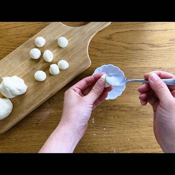 Adding a bit of yogurt to each dough ball