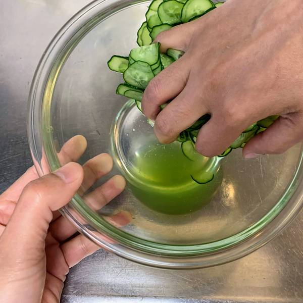 Getting rid of the excess water from the cucumbers