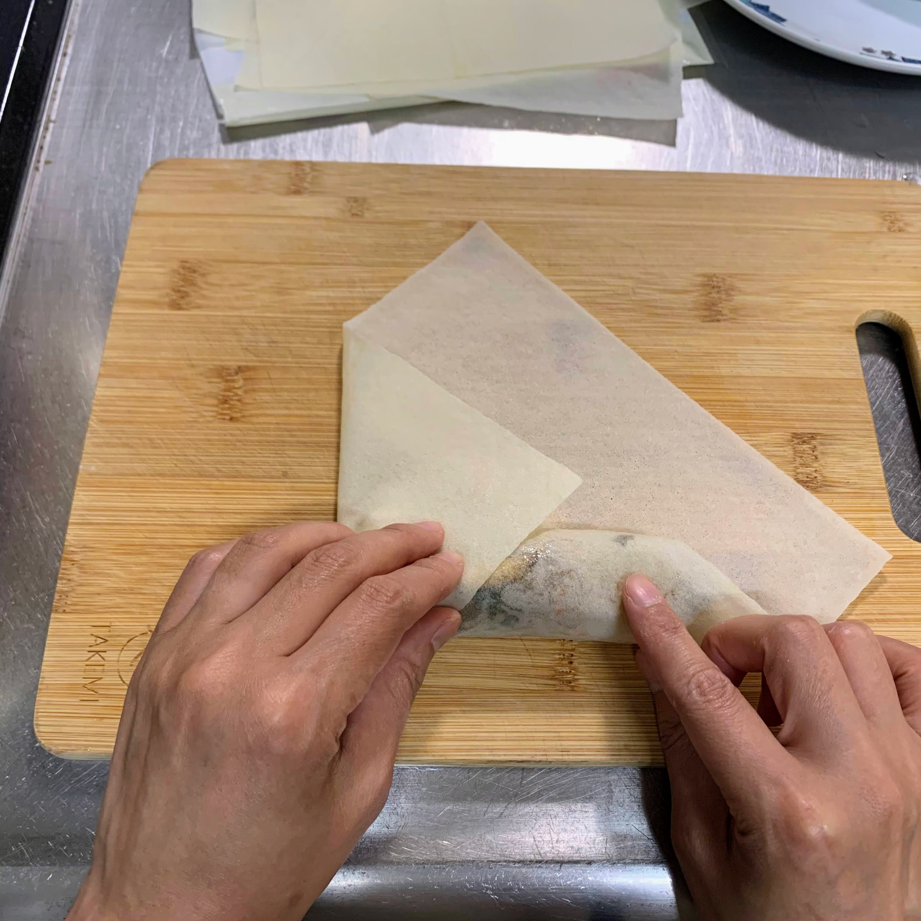 Folding the left corner in 