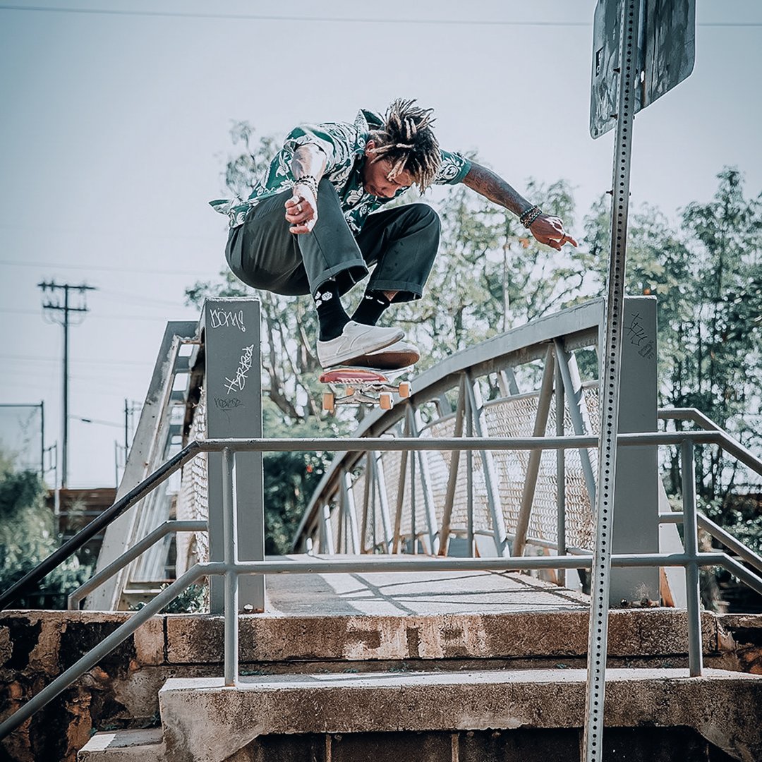 Boo Johnson massive Olie over bridge handrail.