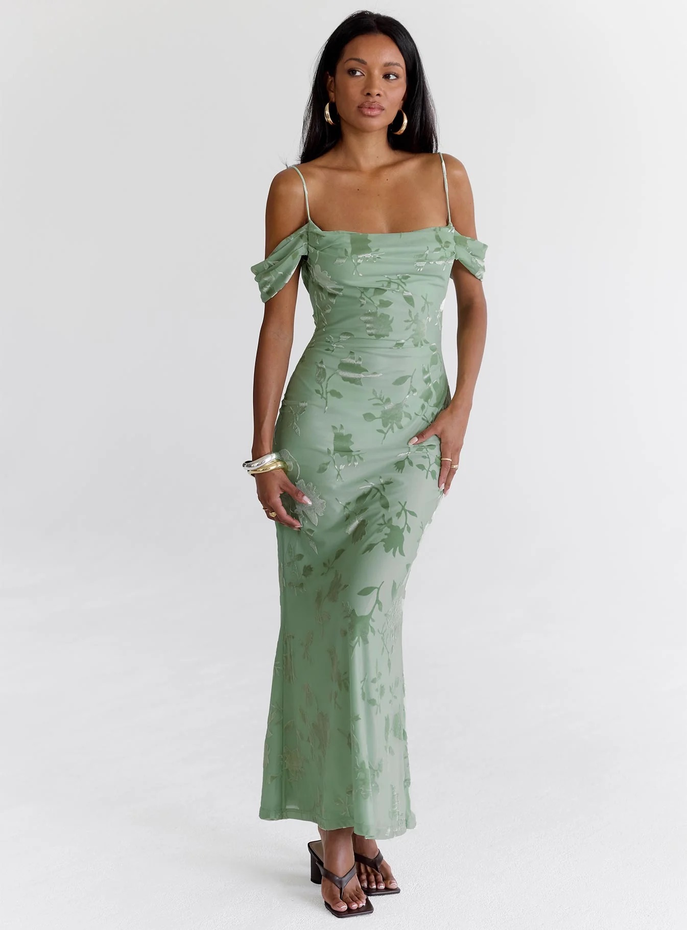 how to style green homecoming dress - model wearing green homecoming dress