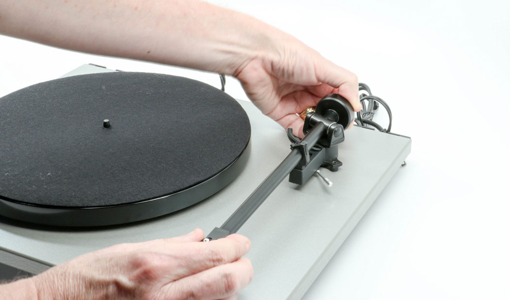 Weight being placed on tonearm image