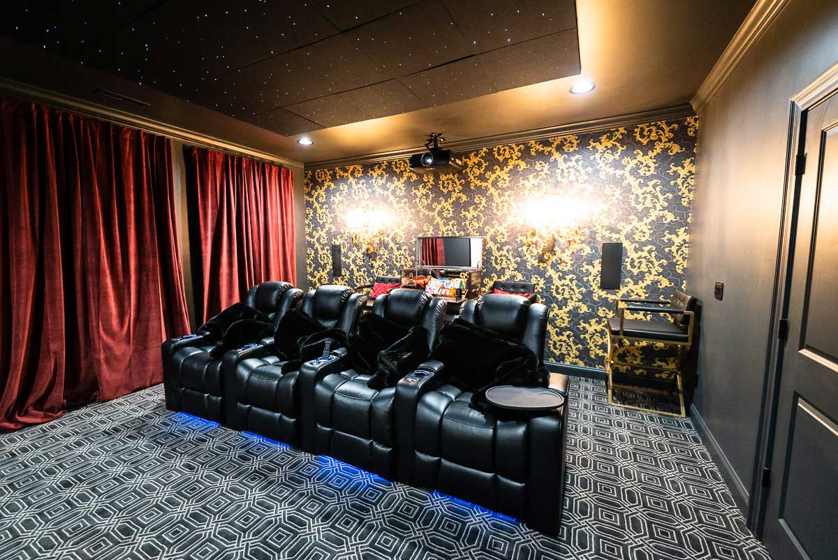 5.2.2 home theater with a row of 4 Audio Advice Revolution chairs