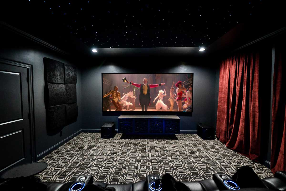 5.2.2 Home theater with two SVS subs and The Greatest Showman playing on Stewart Filmscreen