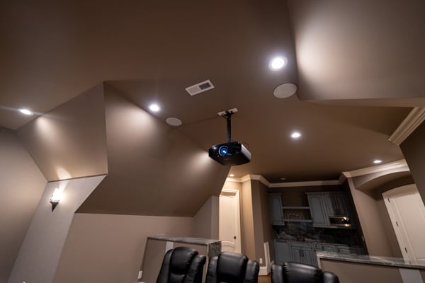 Home theater projector mounted on the ceiling