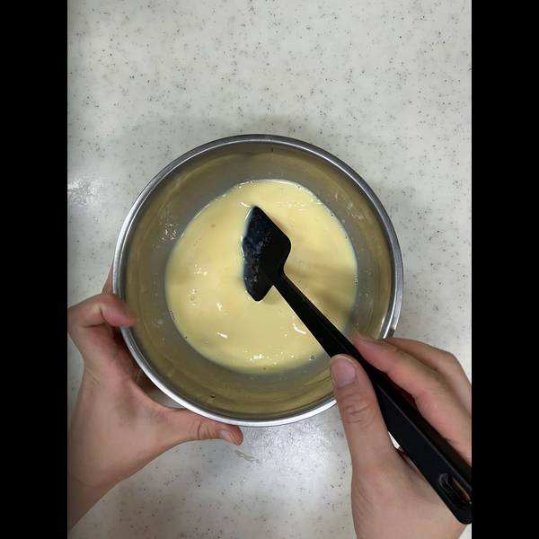 Combining the egg and milk mixtures together