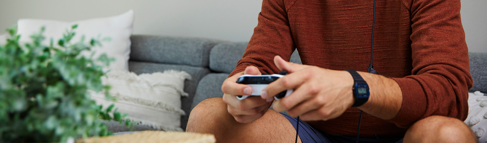 Man playing video game with controller