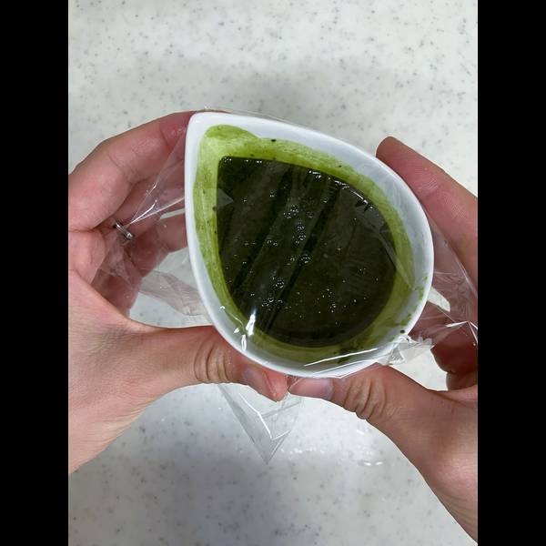Matcha syrup wrapped in plastic wrap