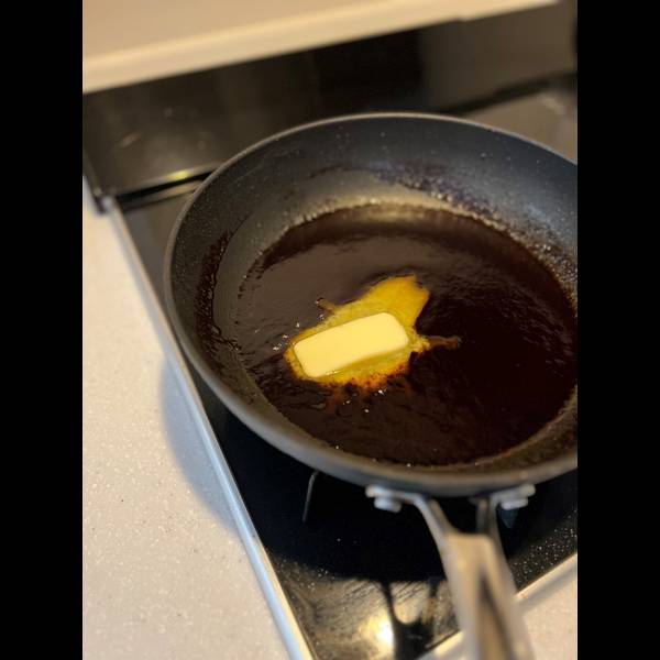 Adding butter to the sauce