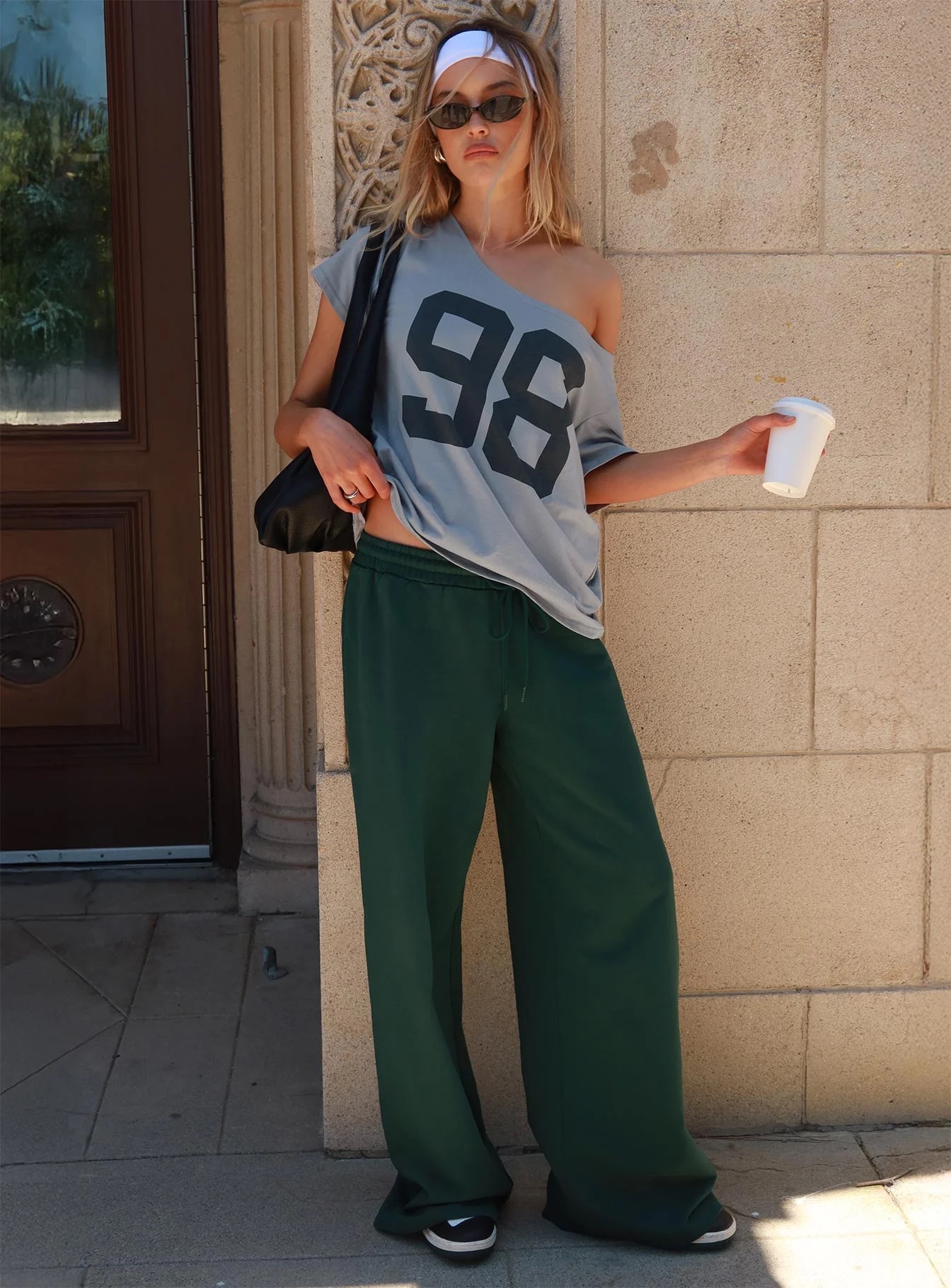 college student wearing princess polly library outfit