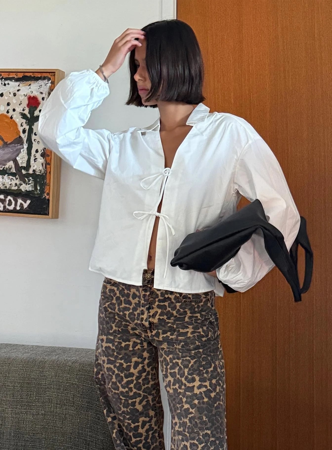 woman wearing white collar neckline long sleeve top