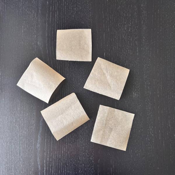Squares of parchment paper