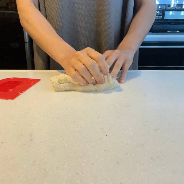 Continuing to knead the dough