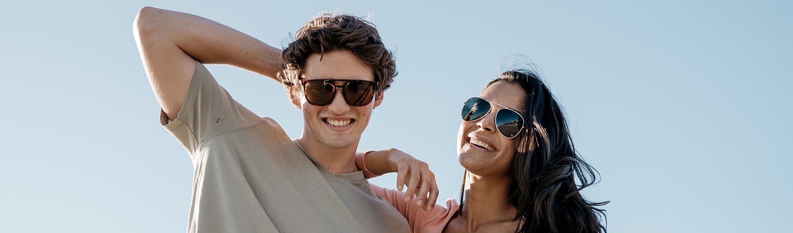 Couple wearing Knockaround polarized sunglasses
