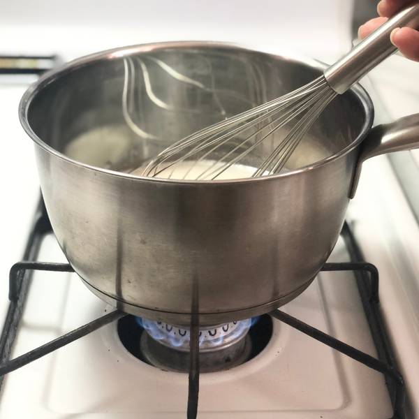 Whisking over low heat
