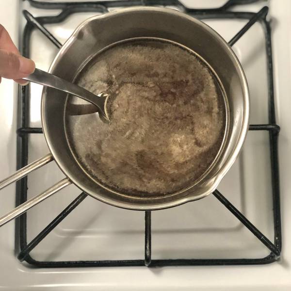 Heating the soup over medium heat