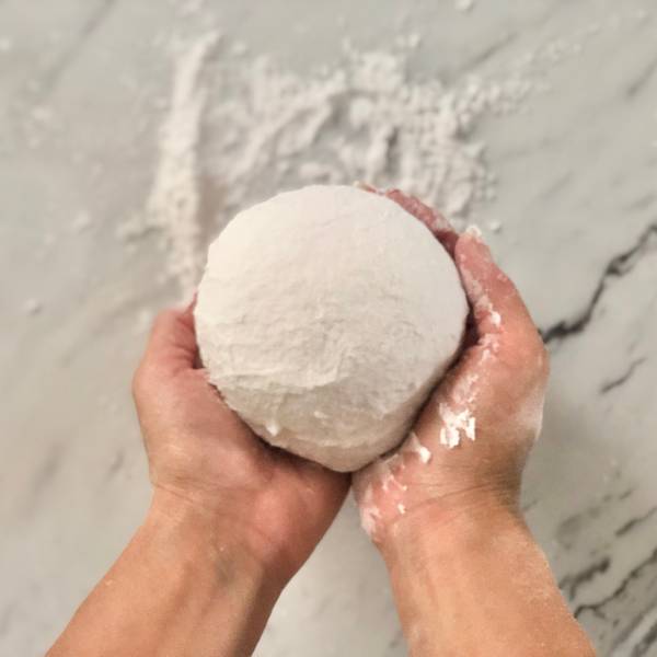 Forming the dough into a ball after kneading