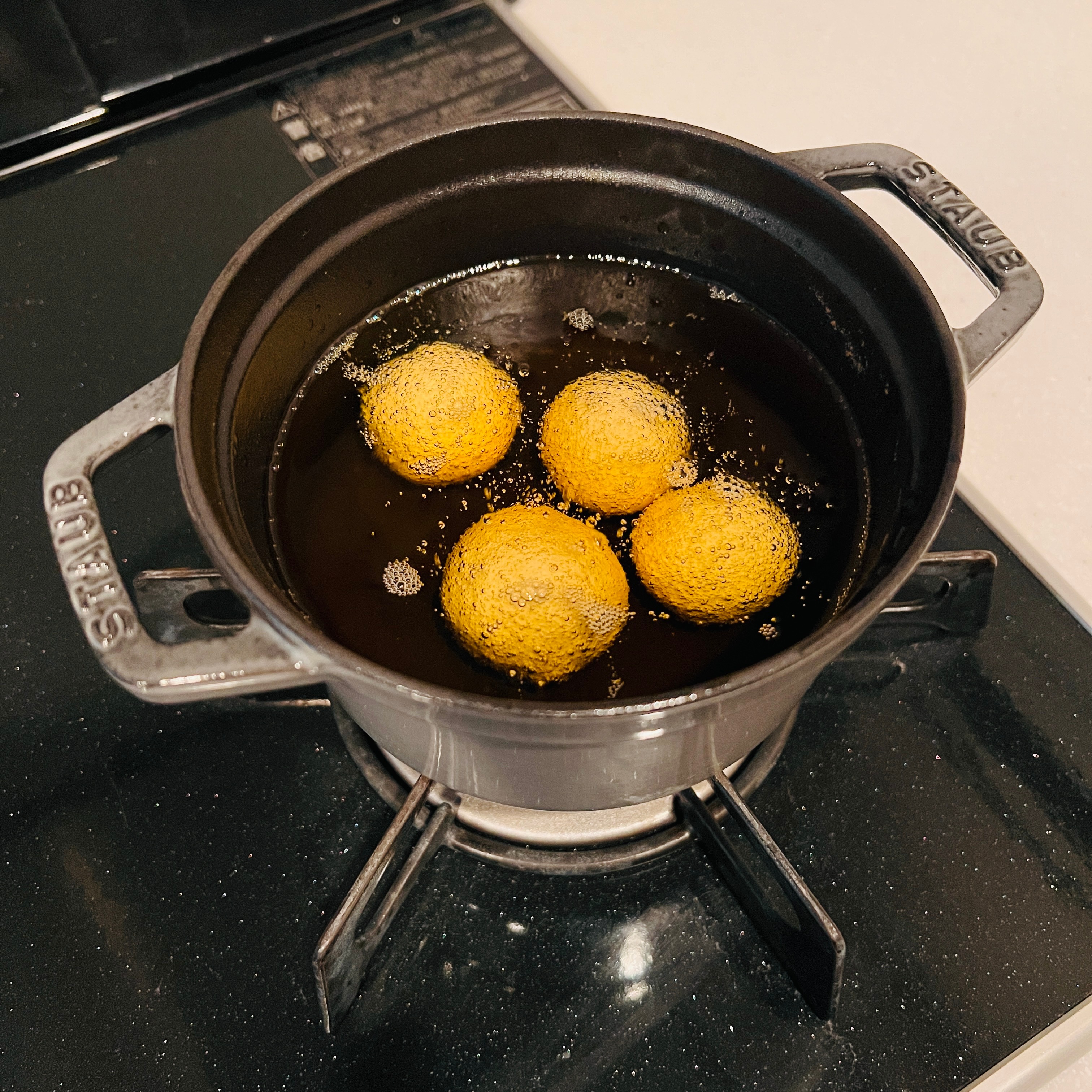 Deep frying sata andagi