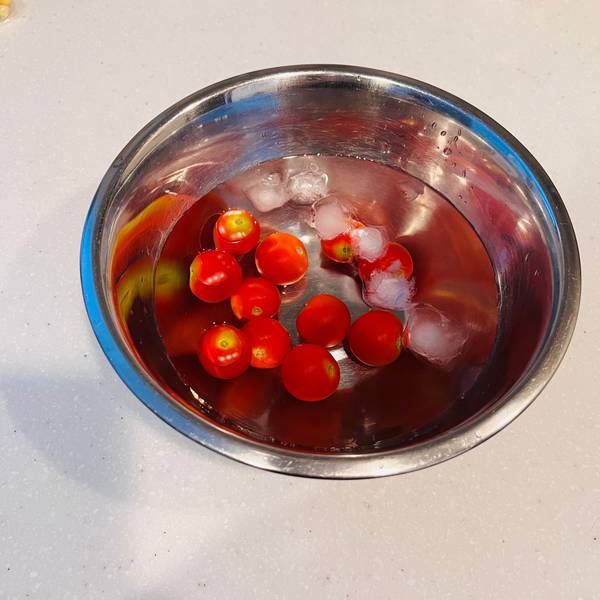 Cooling the cherry tomatoes in an ice bath