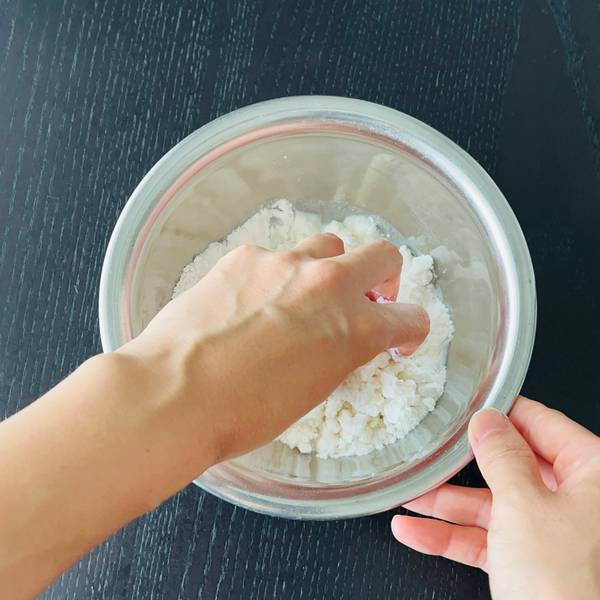 mixing the dango dough with hands